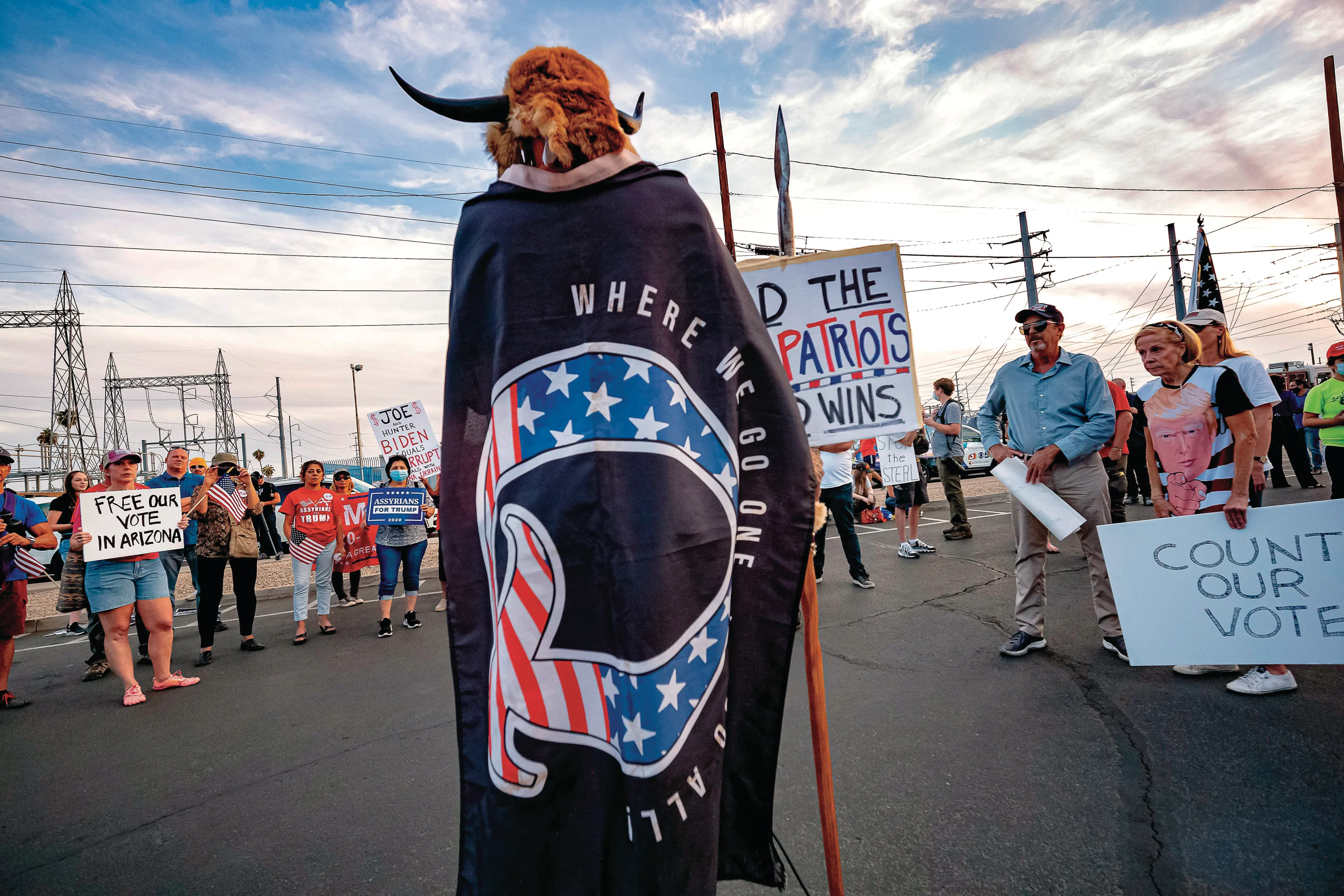 QAnon followers have lost no faith in the movement, despite its many prophetic failures (Olivier Touron/AFP/Getty Images)