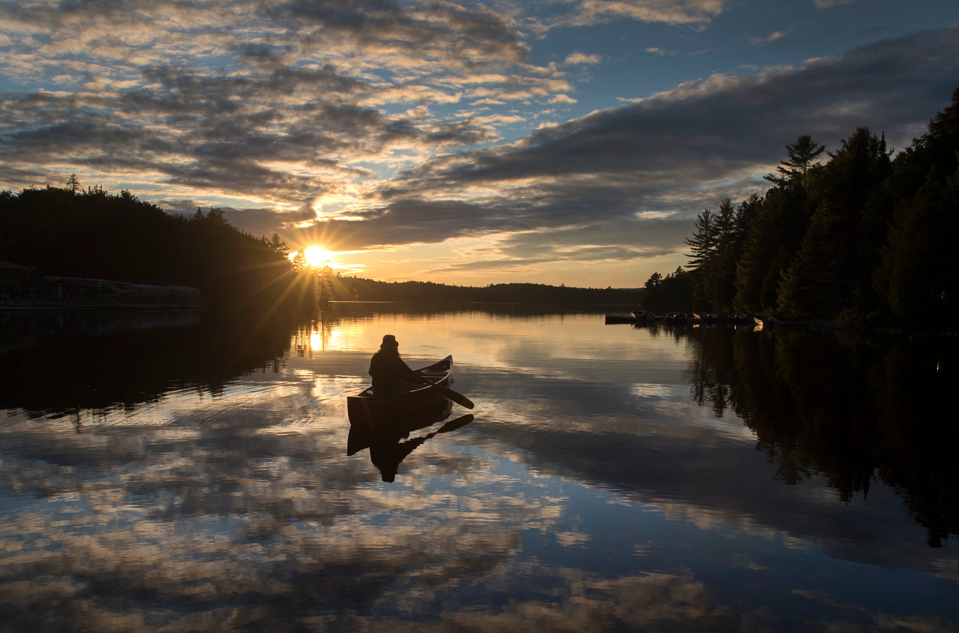 A paddler heads out in Algonquin Park on June 11, 2021 (Fred Thornhill/CP)