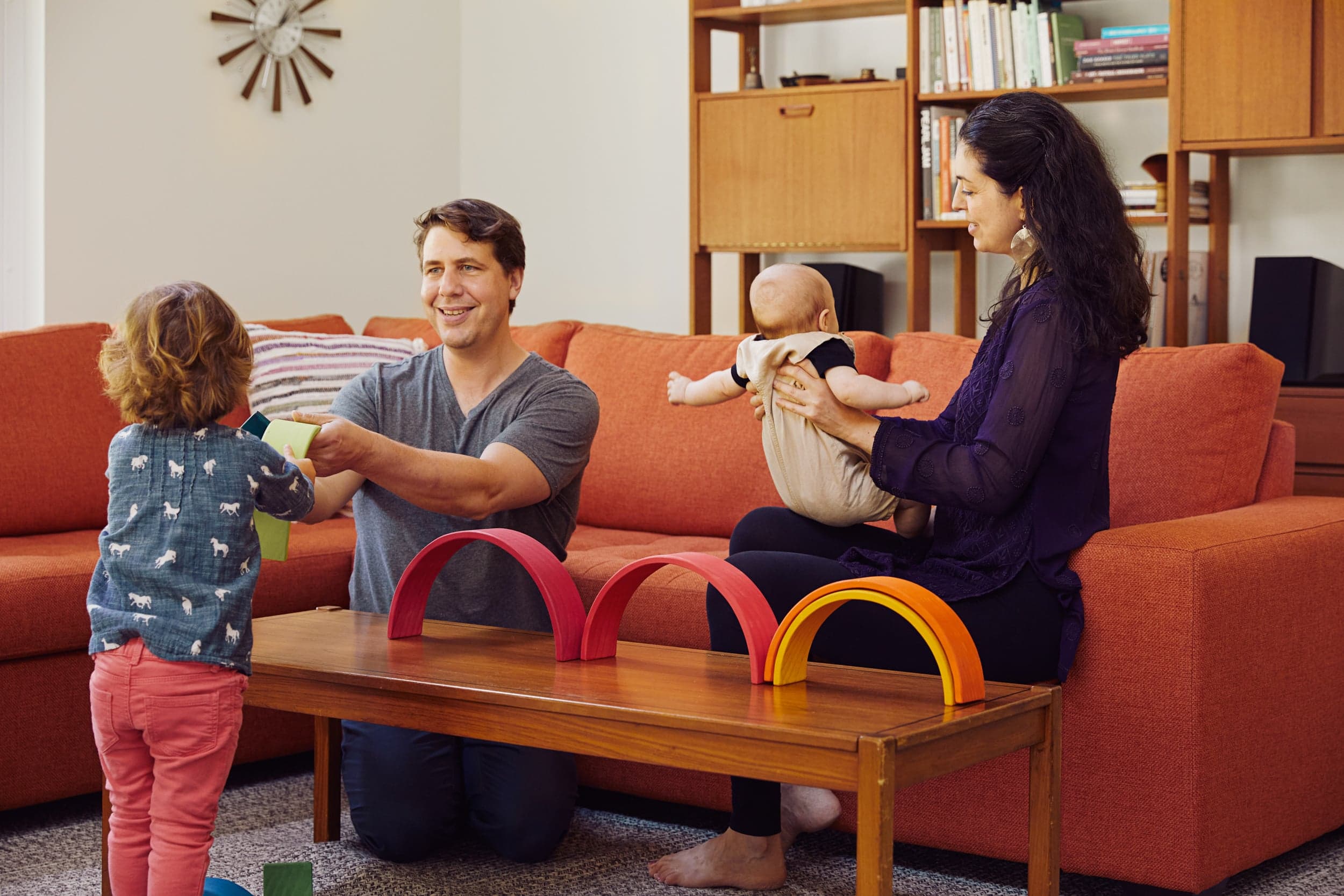 Norbert and Lisa play with their children in thie Quebec home. (Photograph by Sylvie Li)