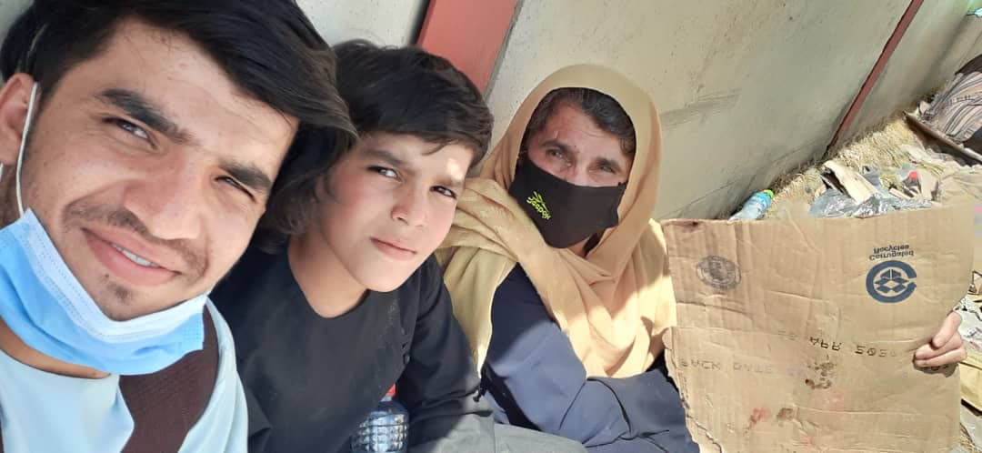 Omar Sahar (left), with his brother Ibrahim, and mother Lailuma. (Courtesy of Omar Sahar)
