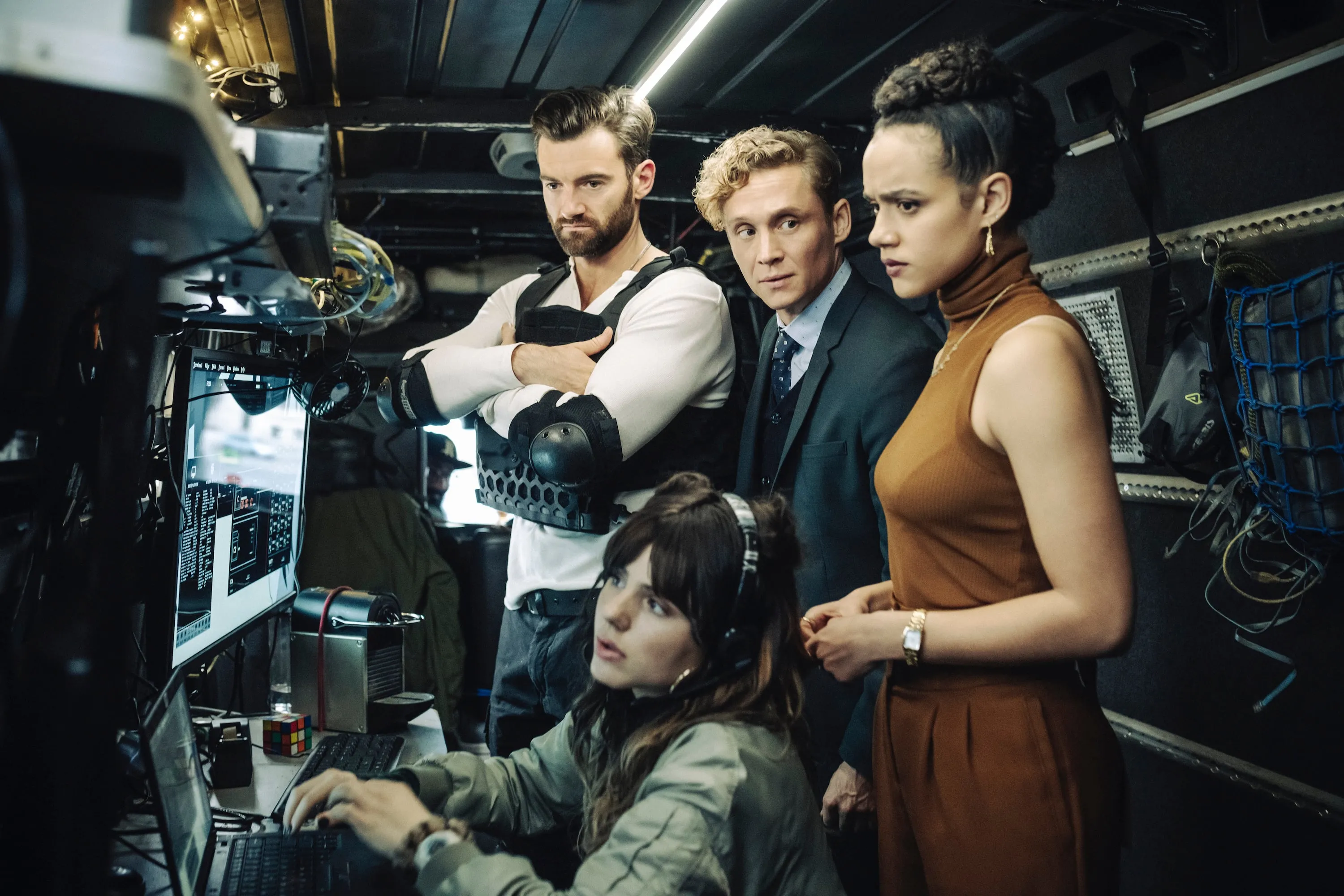 ARMY OF THIEVES (L to R) Stuart Martin as BRAD CAGE, Ruby O. Fee as Korina, Matthias Schweighöfer as LUDWIG DIETER, Nathalie Emmanuel as GWENDOLINE in ARMY OF THIEVES. Photo Credit: Stanislav Honzik/Netflix © 2021