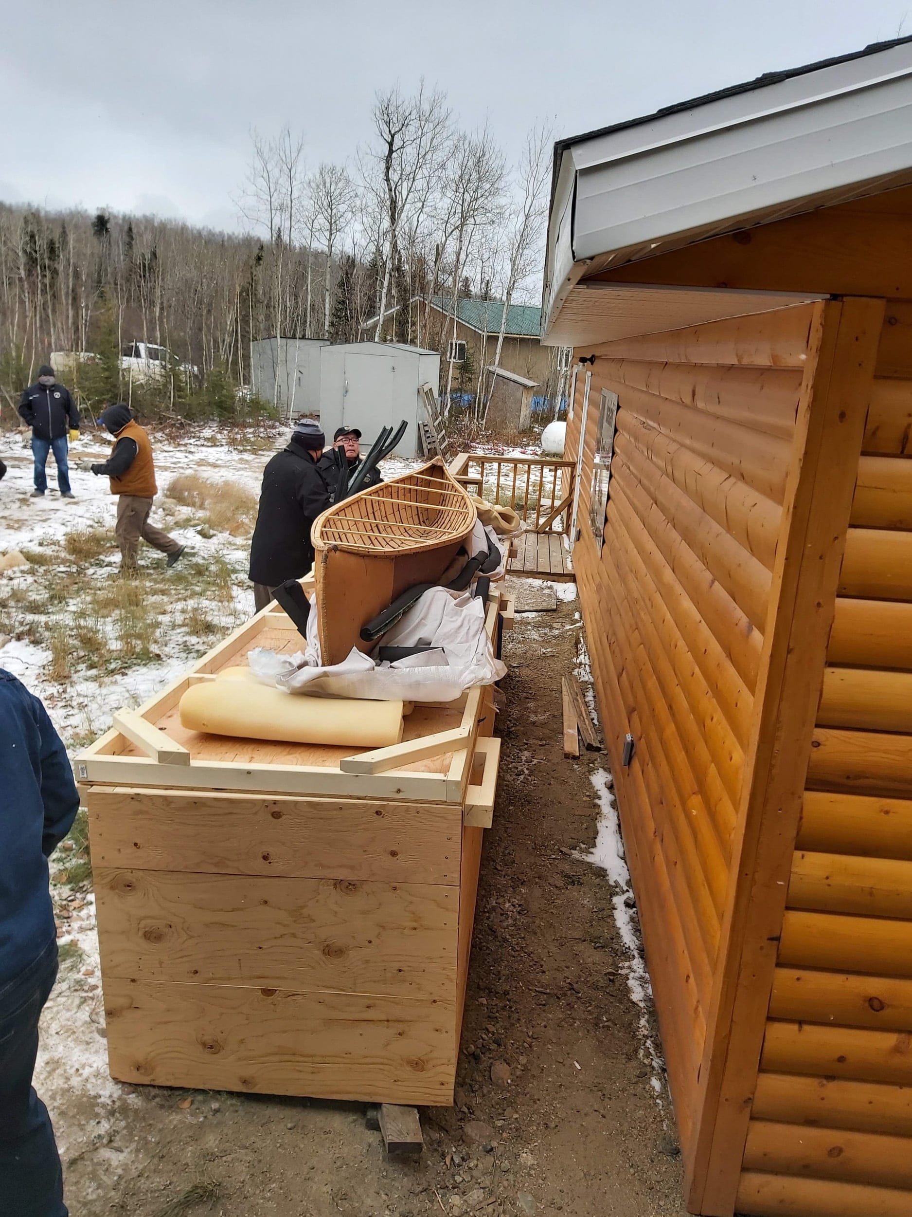 The canoe (here being uncrated) was made in the 1970s near Otter Lake in north-central Saskatchewan (Courtesy of Rose Roberts)