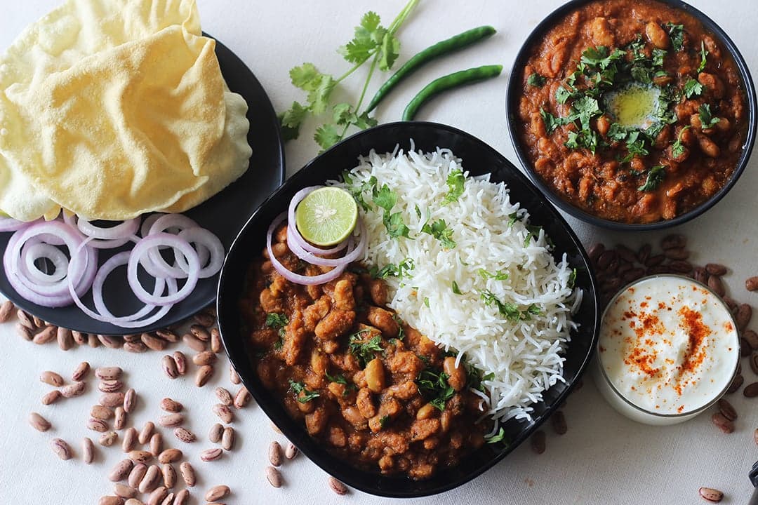 Good food: His mom’s Rajma Chawal (a vegan Punjabi chili and rice dish)...or,on the road, food from Sushi Momo in Montreal