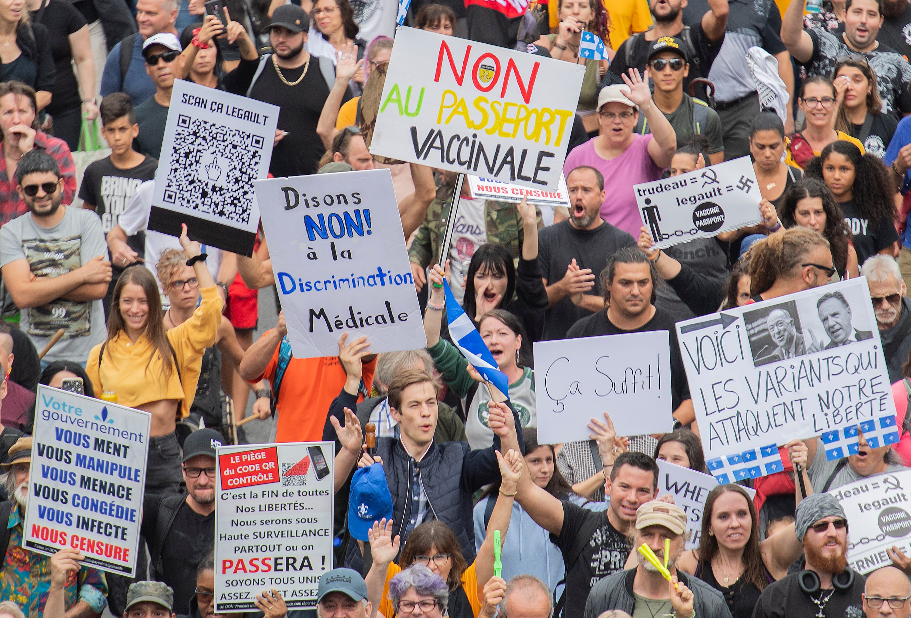 A September protest in Montreal against measures to help curb the spread of COVID-19. The Quebec government announced plans this week to tax the unvaccinated. (Graham Hughes/CP)