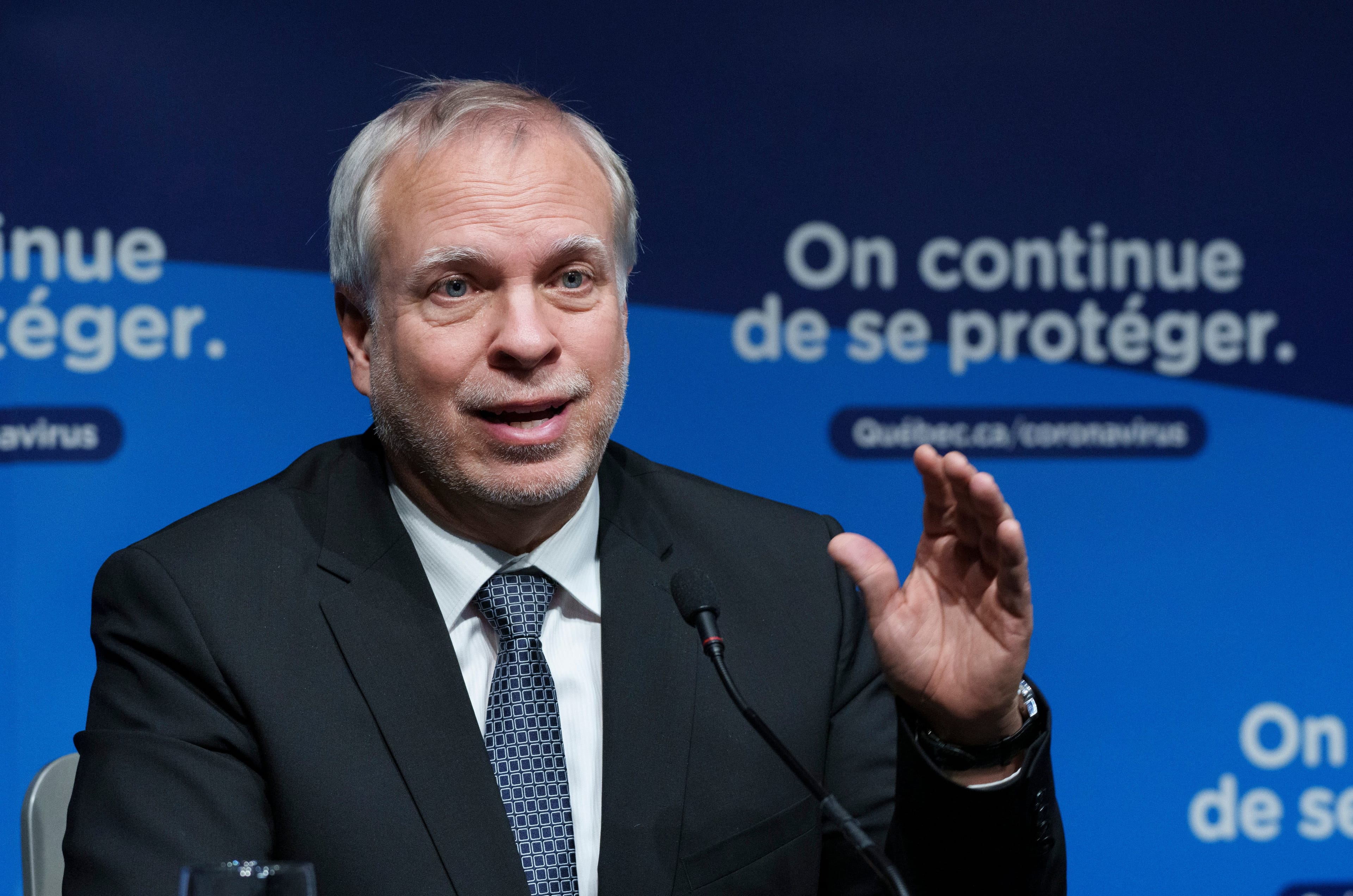 Interim Quebec Director of Public Health Dr. Luc Boileau responds to a question during a news conference in Montreal, Jan. 11, 2022. (Paul Chiasson/The Canadian Press)