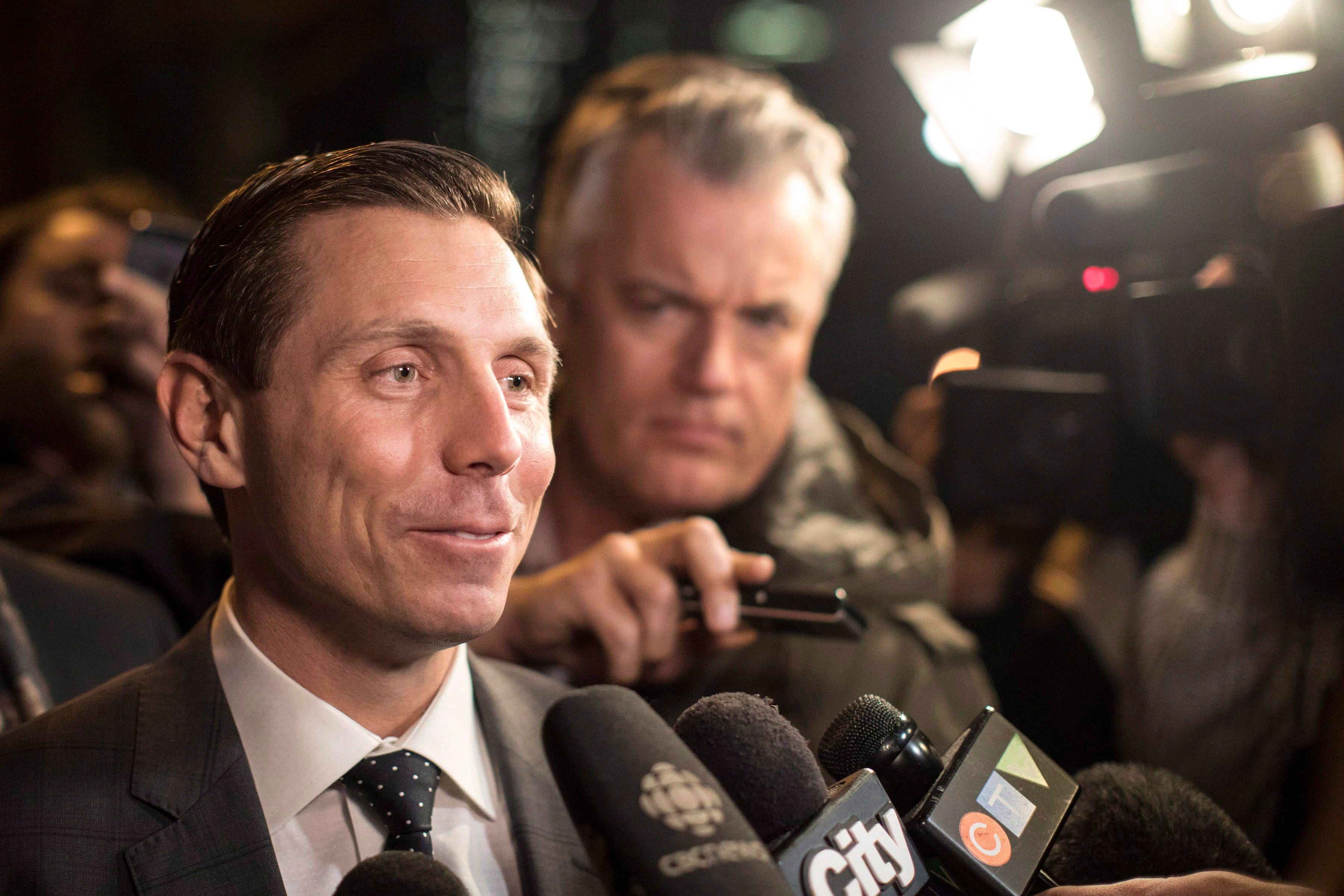 Brown leaves the Ontario PC Party Head Offices in Toronto, February 20, 2018. (Chris Young/The Canadian Press)