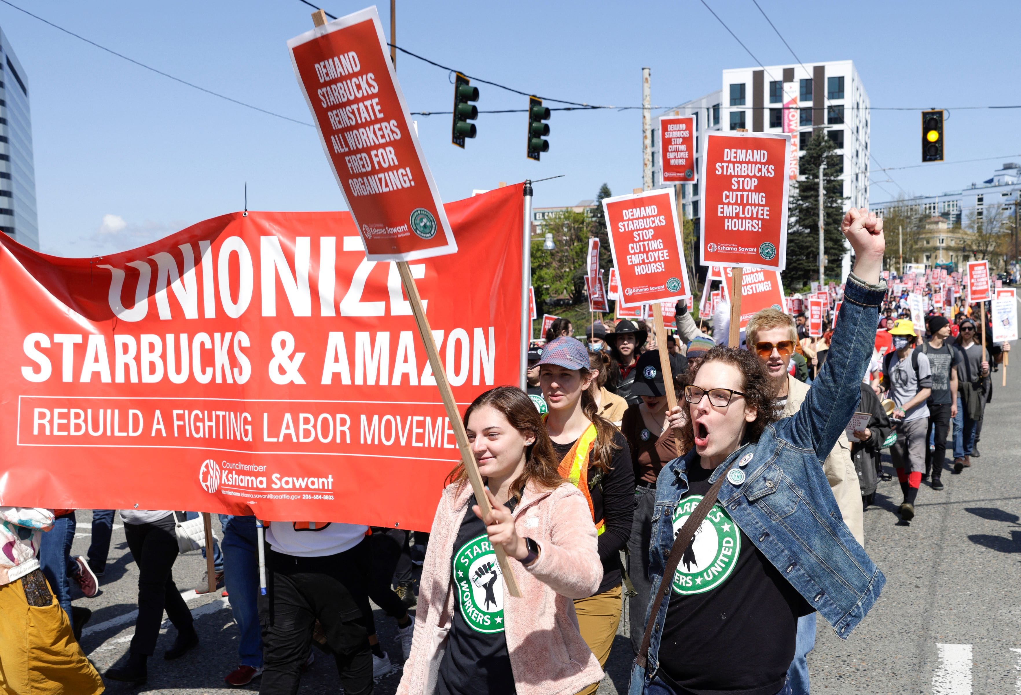 Protesters march during a "Fight Starbucks' Union Busting" rally in Seattle in April (Photo courtesy Jason Redmond/Getty)