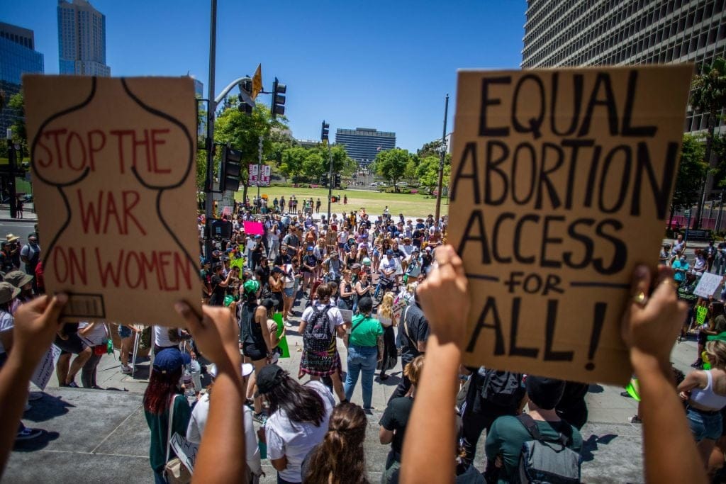 Protestors take to the streets a day after the U.S. Supreme Court released a decision striking down the right to abortion. (Photo by Apu Gomes/Getty)
