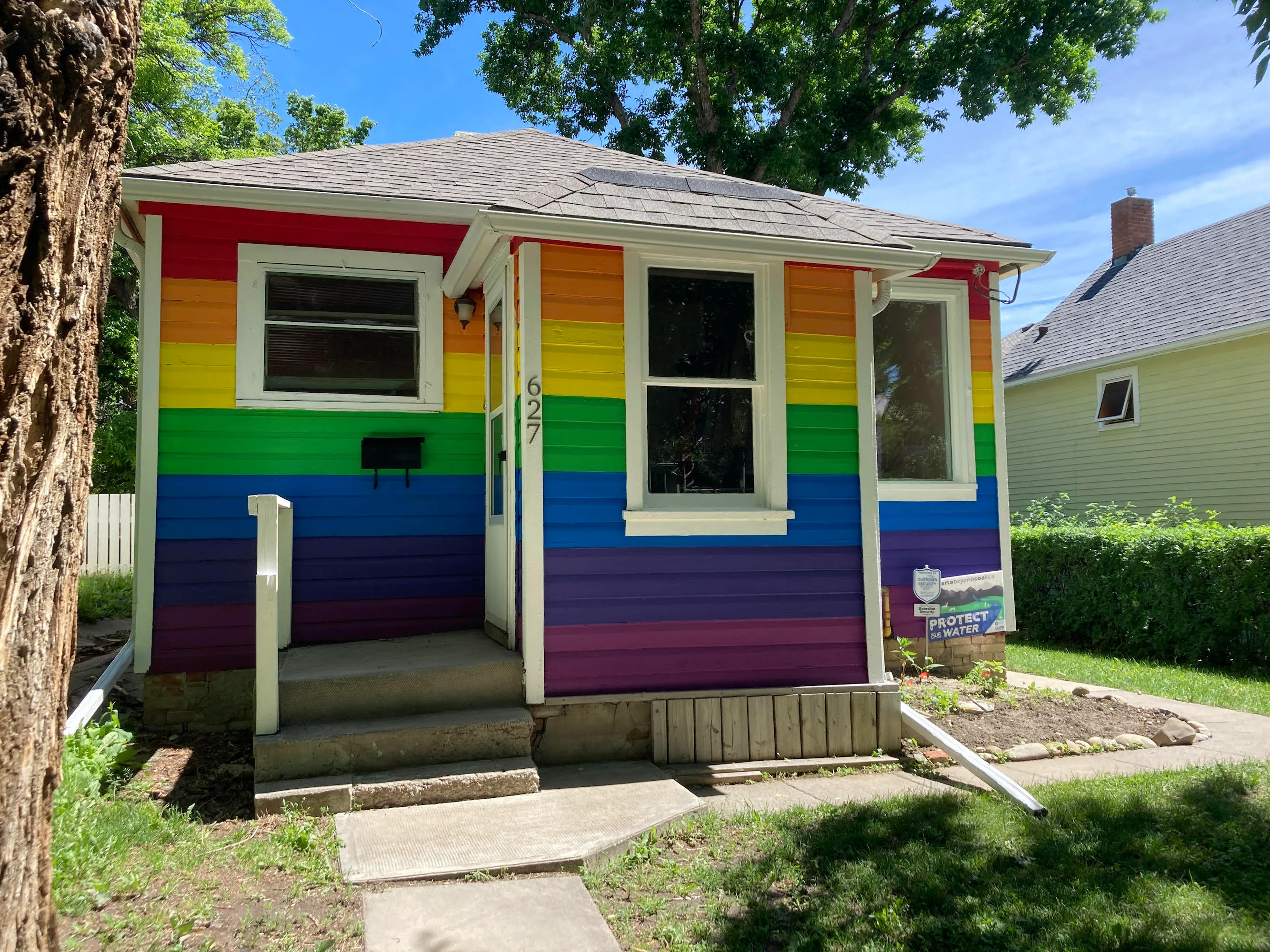The Siever family painted their house all the colours of the rainbow in advance of Pride month in Alberta (photo courtesy Kim Siever)