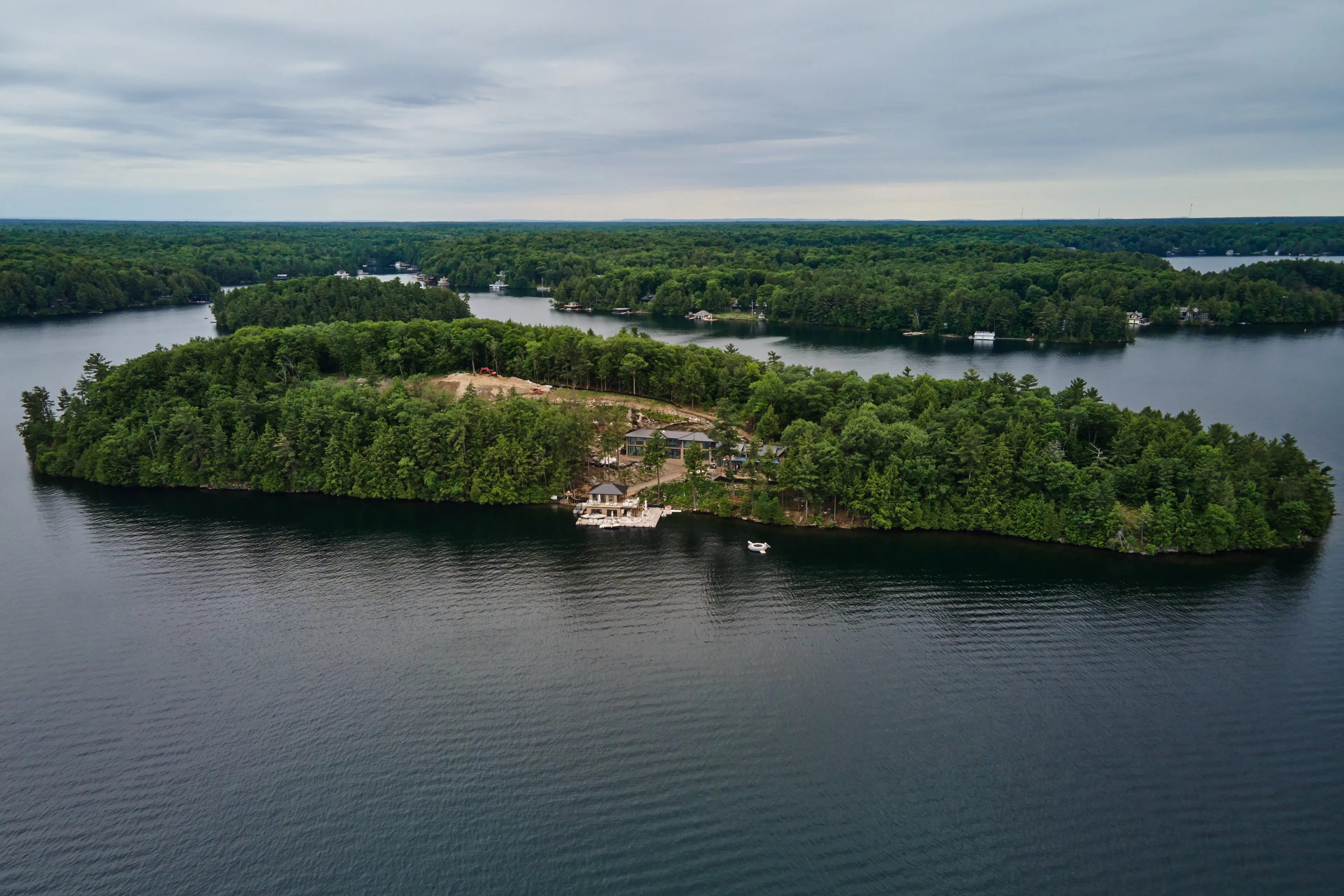 The damage: Joe Azouri dynamited into the Canadian Shield and felled trees to make space for his luxurious cottage. Last summer, locals launched a petition to revoke his building permit. He was later charged with contravening the township's tree conservation and site alteration bylaws (Photography by Patrick Marcoux)