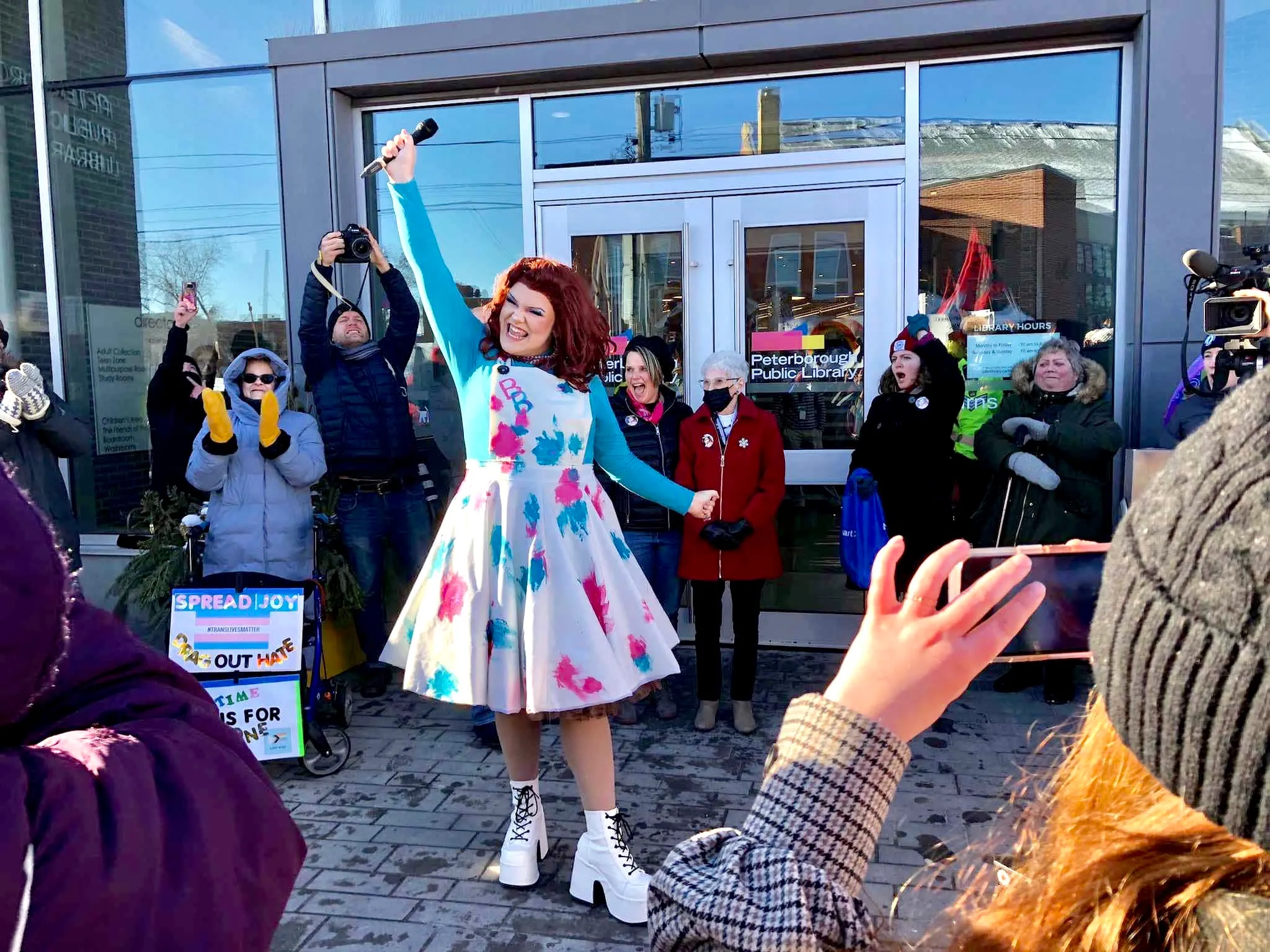 Isaac Maker, aka Betty Baker, addresses waves to the crowd following last weekend's Drag Queen Story Time in Peterborough, Ontario (Photo courtesy Maker)