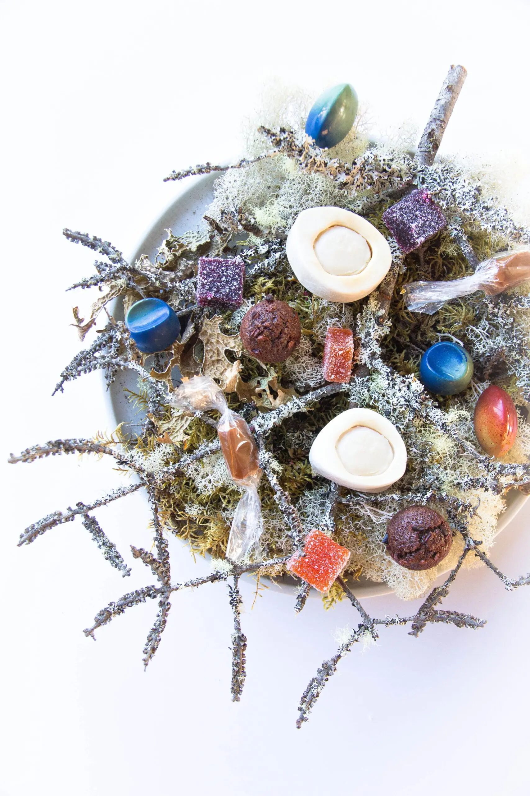 A spread of desserts that looks like a mossy branch