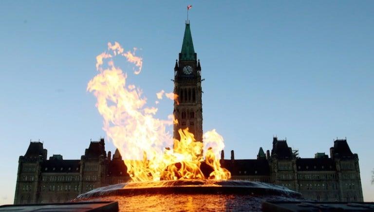<p>The Centre Block of the Parliament Buildings is shown through the Centennial Flame on Parliament Hill in Ottawa on Sunday, January 25, 2015. The House of Commons resumes sitting tomorrow after over a month of recess. THE CANADIAN PRESS/Fred Chartrand</p>

