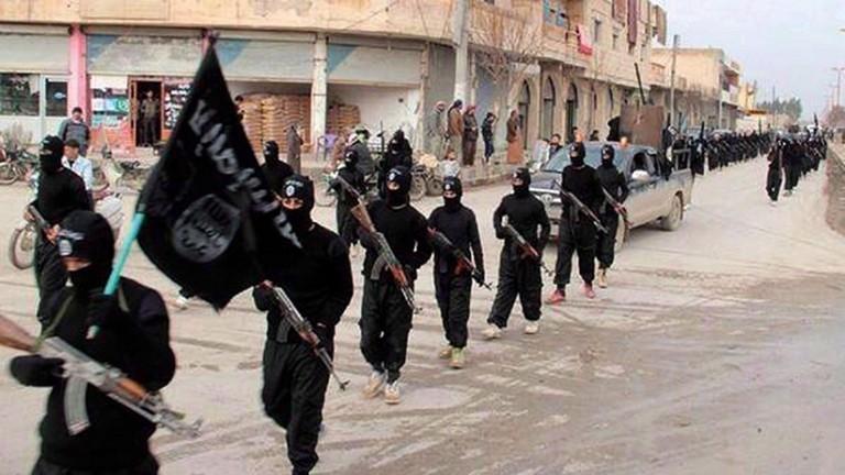 <p>This undated file image posted on a militant website on Jan. 14, 2014, which has been verified and is consistent with other AP reporting, shows fighters from the al-Qaida linked Islamic State of Iraq and the Levant (ISIL) marching in Raqqa, Syria. (AP)</p>
