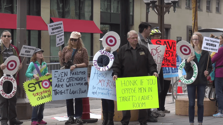 <p>Screen grab of protest (AlphaNews Minnesota via YouTube)</p>
