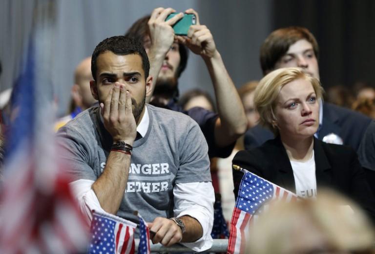 <p>Hillary Clinton supporters react as results come in at an election night party for the Democratic presidential candidate at the Jacob K. Javits Convention Center in New York, late on Tuesday, Nov. 8, 2016.   (Vernon Bryant/The Dallas Morning News via AP)</p>
