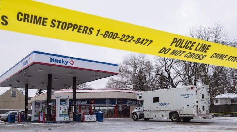 <p>Homicide detectives investigate at a Mac&#8217;s convenience store in Edmonton on Friday, December 18, 2015. THE CANADIAN PRESS/John Ulan</p>
