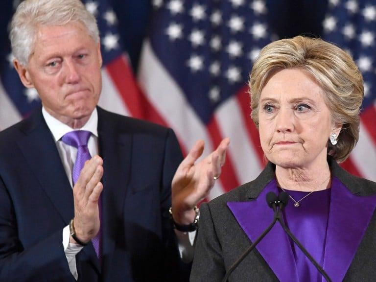 <p>US Democratic presidential candidate Hillary Clinton makes a concession speech after being defeated by Republican President-elect Donald Trump, as former President Bill Clinton looks on in New York on November 9, 2016. (Jewel Samad/AFP/Getty Images)</p>
