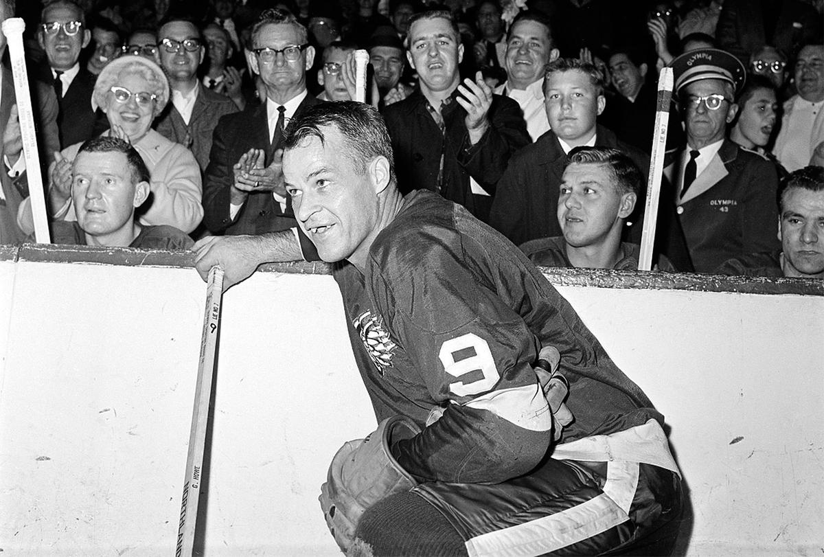 In this Nov. 10, 1963 file photo, the Detroit Red Wings' Gordie Howe (9)  acknowledges applause from the fans during a 20-minute standing ovation after he scored the 545th cgoal of his National Hockey League career at Detroit's Olympia Stadium, to set the leagues'  to set the all-time scoring mark. The NHL has the best names in the business. Nicknames, that is. Little Ball of Hate. The Great One. Tazer. Bicksy.  How is known as the 