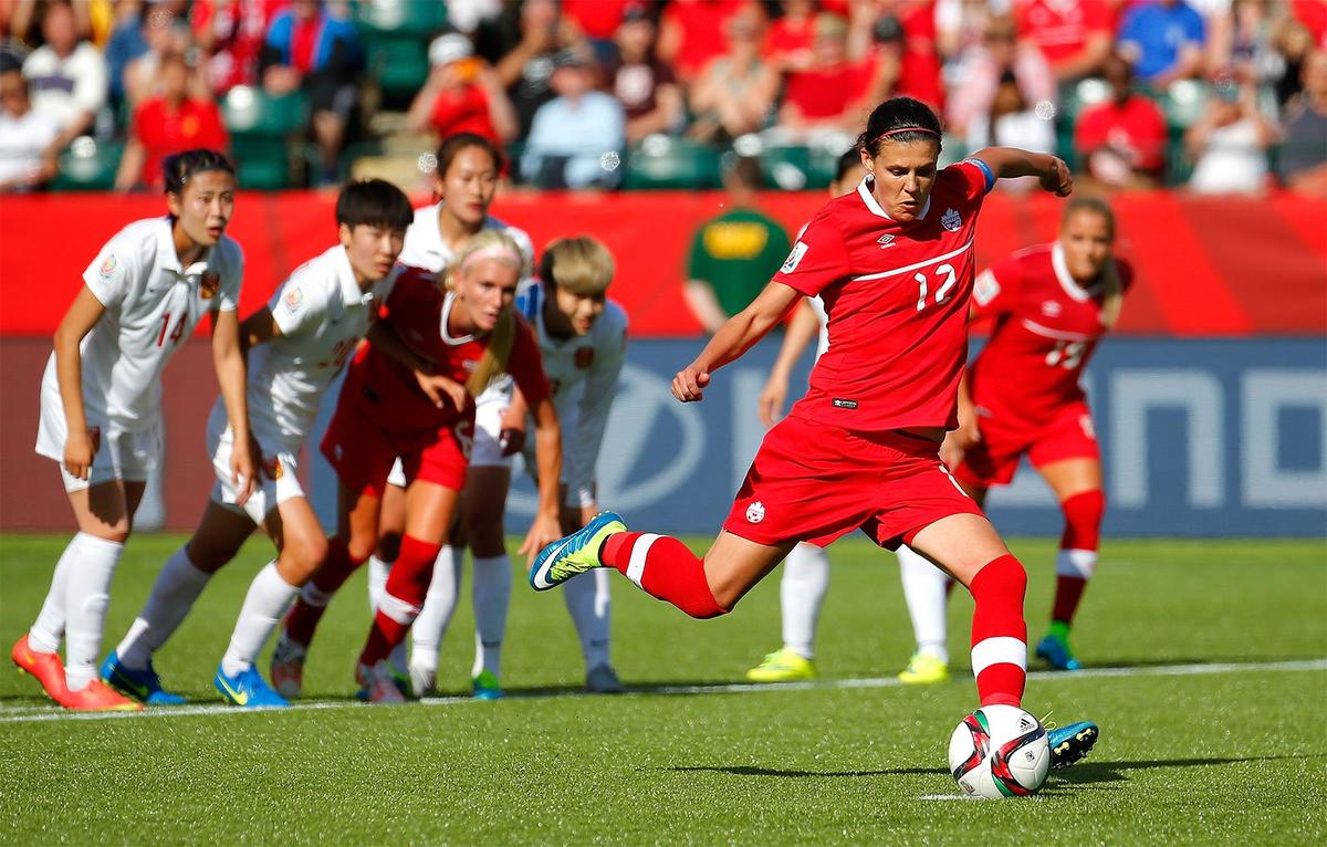 Christine Sinclair #12 of Canada kicks the go-ahead goal on a penalty kick in the final minutes against China PR during the FIFA Women's World Cup Canada 2015 Group A match between Canada and China PR at Commonwealth Stadium on June 6, 2015 in Edmonton, Canada. (Kevin C. Cox/Getty Images)