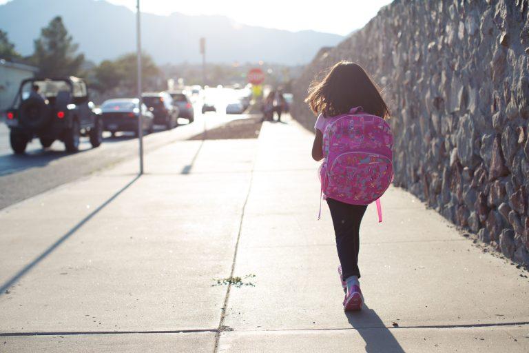 girl walking to school