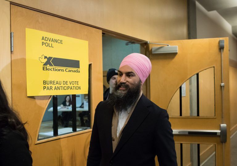 NDP Leader Jagmeet Singh leaves an advance poll after casting his ballot for the federal byelection in Burnaby South, B.C. (The Canadian Press/Darryl Dyck)