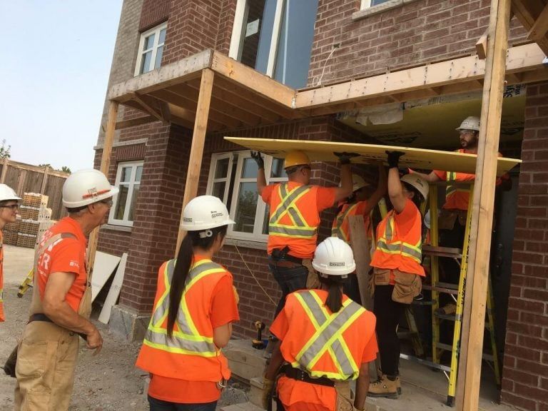 Home Depot employees working on a Habitat for Humanity construction project in September 2017. (Habitat GTA)