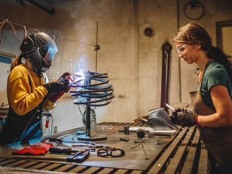 Two women working in a workshop