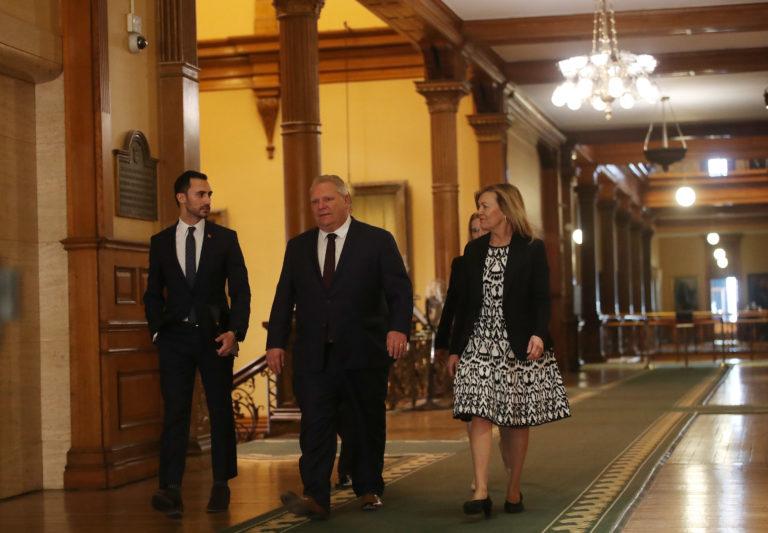 TORONTO, ON- MARCH 20 - Doug Ford and key cabinet Ministers walk with Education Minister Stephen Lecce who will make an announcement as The Province of Ontario hold a COVID-19 press conference. in Toronto. March 20, 2020. (Steve Russell/Toronto Star via Getty Images)
