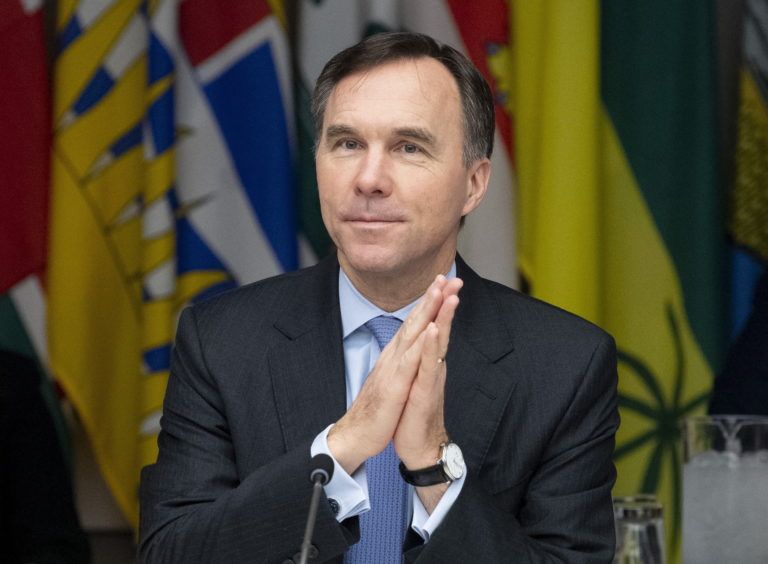 Minister of Finance Bill Morneau waits to begin a meeting with federal and provincial counterparts on Dec. 17, 2019 in Ottawa. (CP/Adrian Wyld)