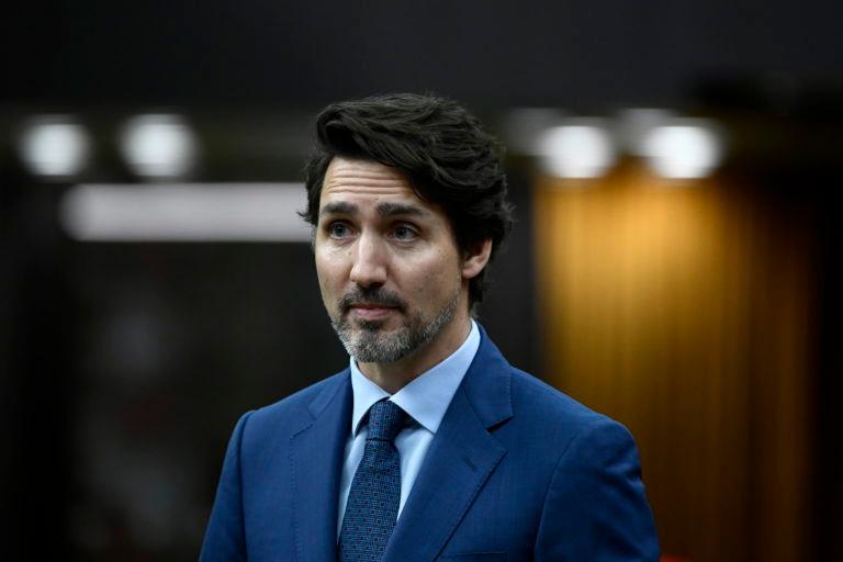 Prime Minister Justin Trudeau rises in the House of Commons on Parliament Hill in Ottawa, as Parliament was recalled for the consideration of measures related to the COVID-19 pandemic, on Saturday, April 11, 2020. THE CANADIAN PRESS/Justin Tang