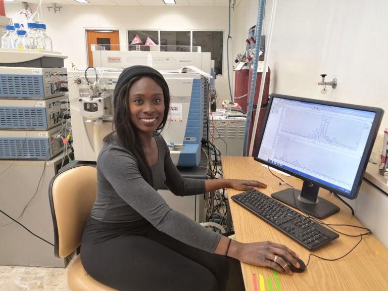Evelyn Asiedu uses the Orbitrap mass spectrometer to view data for her research at the University of Alberta. (Courtesy of Evelyn Asiedu)