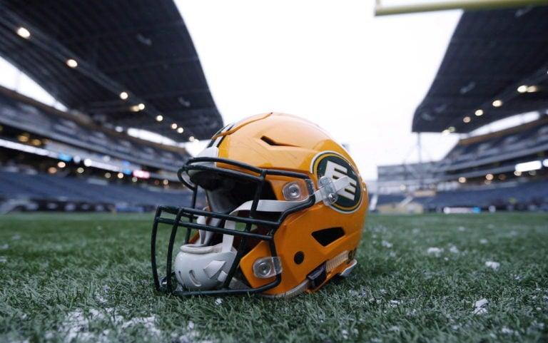 A helmet belonging to an Edmonton player is seen on the field during a team practice session in Winnipeg on Nov. 25, 2015. The CFL squad made the move Tuesday, following a similar decision by the NFL's Washington team as pressure mounts on teams to eliminate racist or stereotypical names. (John Woods/CP)