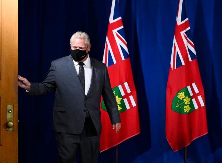 Ontario Premier Doug Ford arrives for a news conference at Queen's Park during the COVID-19 pandemic in Toronto on Monday, September 28, 2020. THE CANADIAN PRESS/Nathan Denette