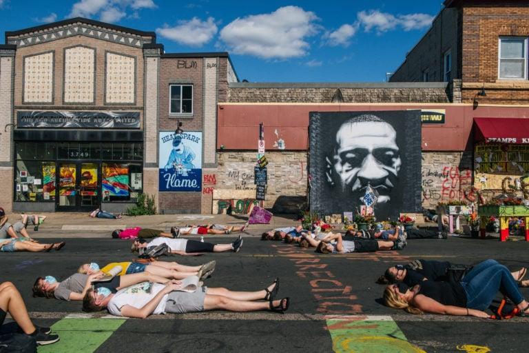 People stage a ‘die-in’ in Minneapolis at the site where George Floyd was killed by police (Brandon Bell/Getty Images)