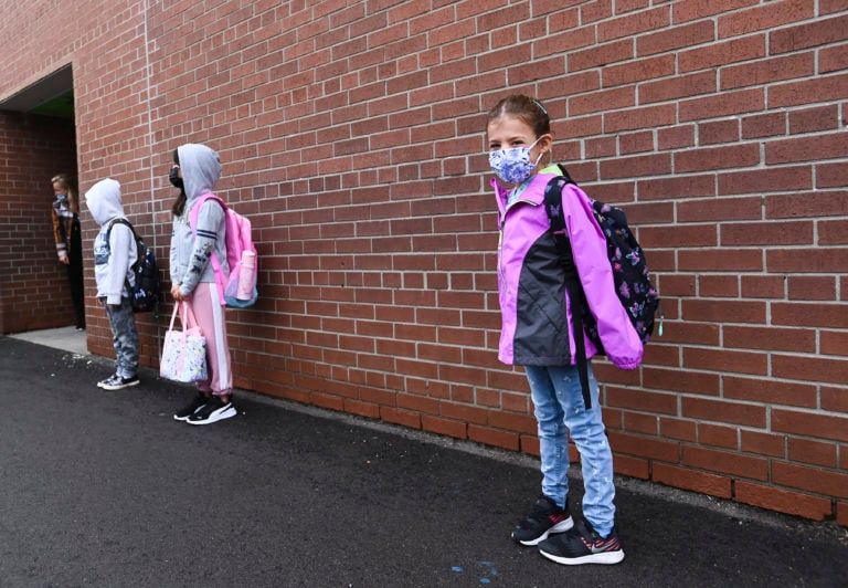 Children lining up for elementary school in Mississauga, Ont. (Nathan Denette/CP)