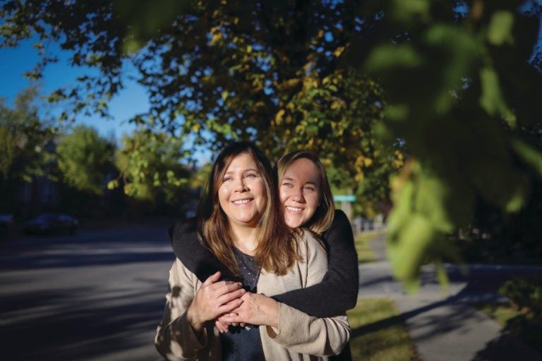 Carson (right) and her mother, Kirsten Korchinsky, outside their Calgary home(Photograph by Leah Hennel)