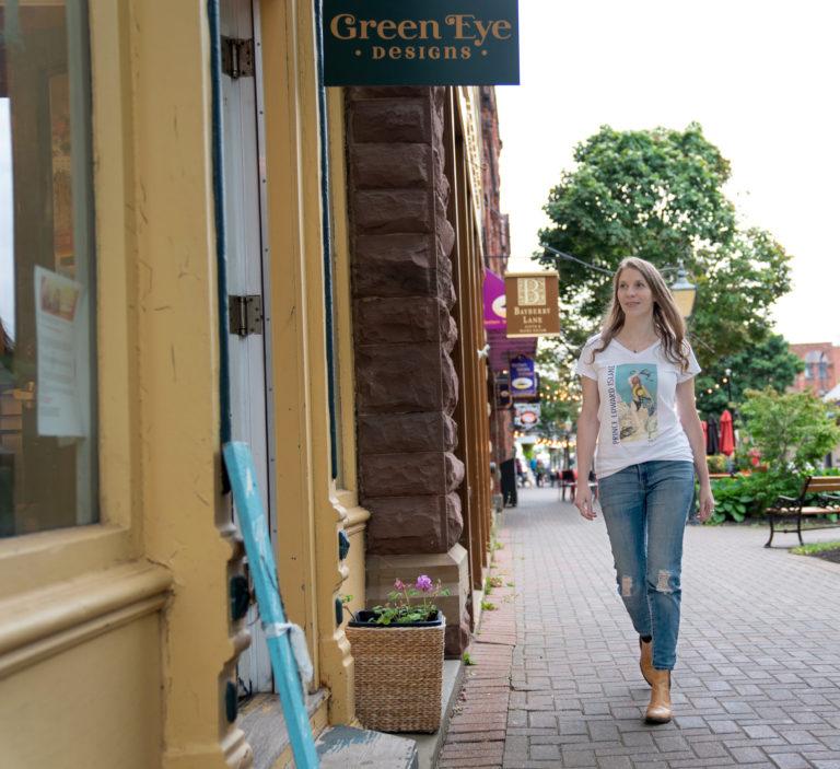 Savannah Belsher-MacLean waSavannah Belsher-MacLean walks towards her store, Green Eye Designs on Victoria Row in Charlottetown, where the "topless Anne" shirts are available. (Photograph by John Morris)lks towards her store, Green Eye Designs, on Victoria Row in Charlottetown, PEI on September 18, 2020. (Photograph by John Morris)