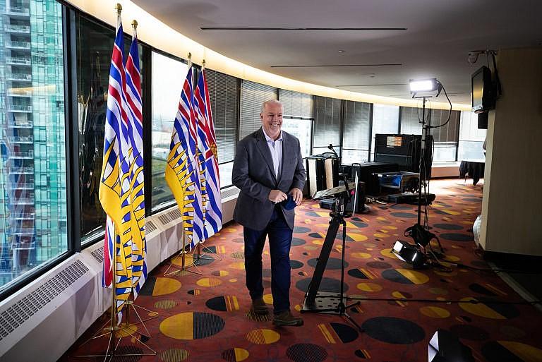 John Horgan smiles as he leaves a post-election news conference in Vancouver, on Sunday, Oct. 25, 2020. (Darryl Dyck/CP)