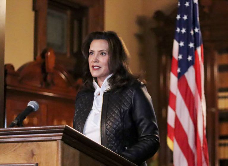 In a photo provided by the Michigan Office of the Governor, Michigan Gov. Gretchen Whitmer addresses the state during a speech in Lansing, Mich., Thursday, Oct. 8, 2020. The governor delivered remarks addressing Michiganders after the Michigan Attorney General, Michigan State Police, U.S. Department of Justice, and FBI announced state and federal charges against 13 members of two militia groups who were preparing to kidnap and possibly kill the governor. (Michigan Office of the Governor via AP/CP)
