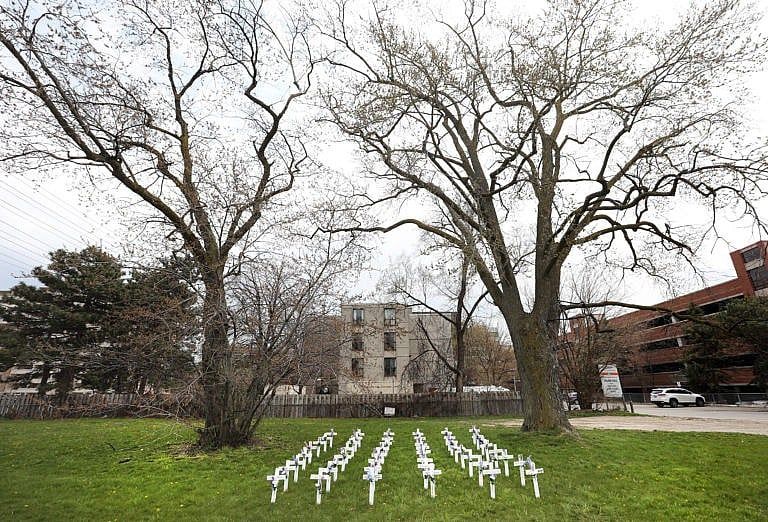 Crosses on the lawn of the Camilla Care Community nursing home in Mississauga, Ont., in May, representing the residents who died of COVID-19 (Richard Lautens/Toronto Star/Getty Images)