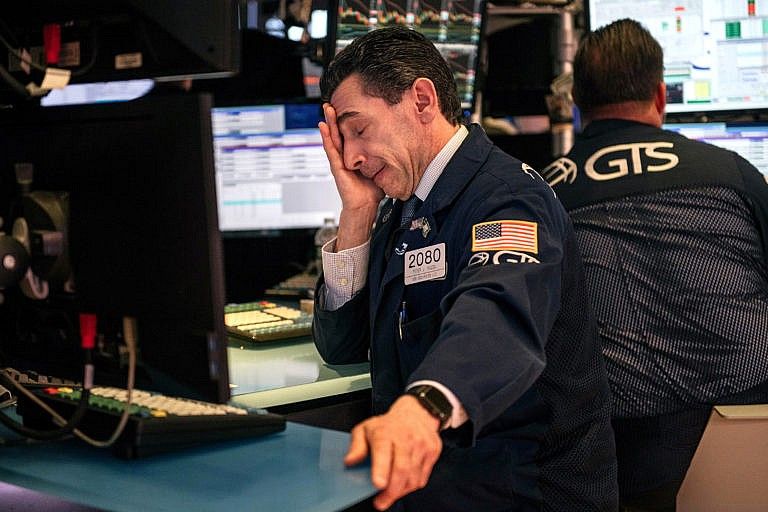 Traders at the NYSE in late February; fears over COVID prompted a stock market plunge (Scott Heins/Getty Images)