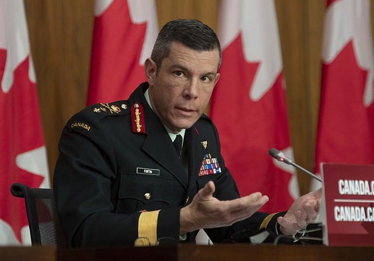 Major General Dany Fortin responds to a question during a news conference in Ottawa, Monday, Dec. 7, 2020. THE CANADIAN PRESS/Adrian Wyld