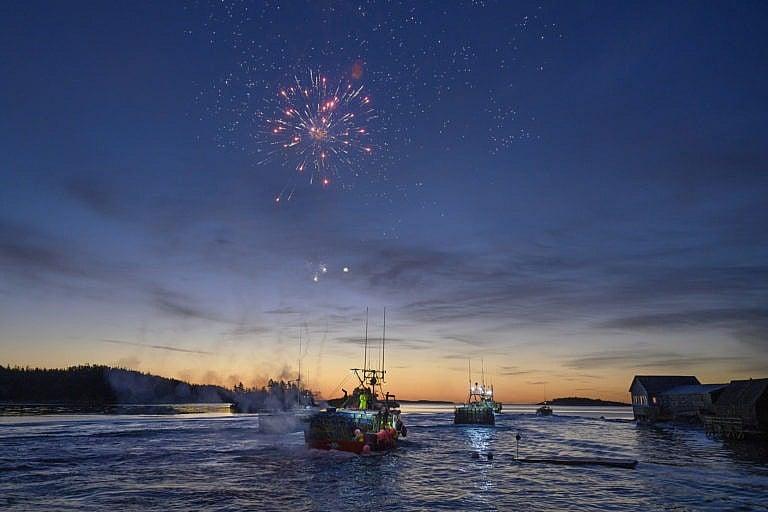 Fireworks are fired from a lobster boat as fishers leave the West Dover wharf at first light on Dumping Day Monday, November 30, 2020 - marking the beginning of the lucrative commercial lobster season in LFA 33/34 on the South Shore of Nova Scotia. (Darren Calabrese)