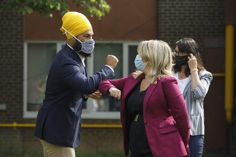 NDP Leader Jagmeet Singh and Ontario NDP MPP Marit Stiles bump elbows after a press conference on the federal and provincial government's back to school plans, in Toronto, Aug. 26, 2020 (CP/Cole Burston)