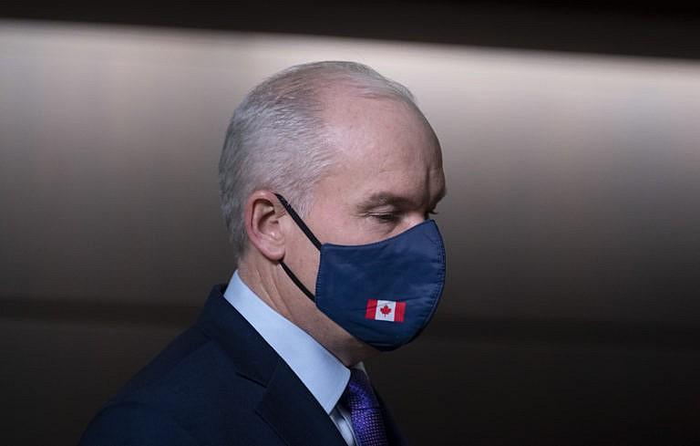 O'Toole walks to the podium at the start of a news conference on Parliament Hill in Ottawa on Feb. 26, 2021 (CP/Adrian Wyld)