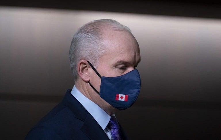O'Toole walks to the podium at the start of a news conference on Parliament Hill on Feb. 26, 2021 (CP/Adrian Wyld)