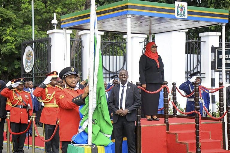 Samia Suluhu Hassan, right, is sworn in as president of Tanzania at a ceremony at State House in Dar es Salaam. She is the country's first female president. (AP/CP)