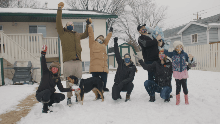 Albertan family celebrating in the snow