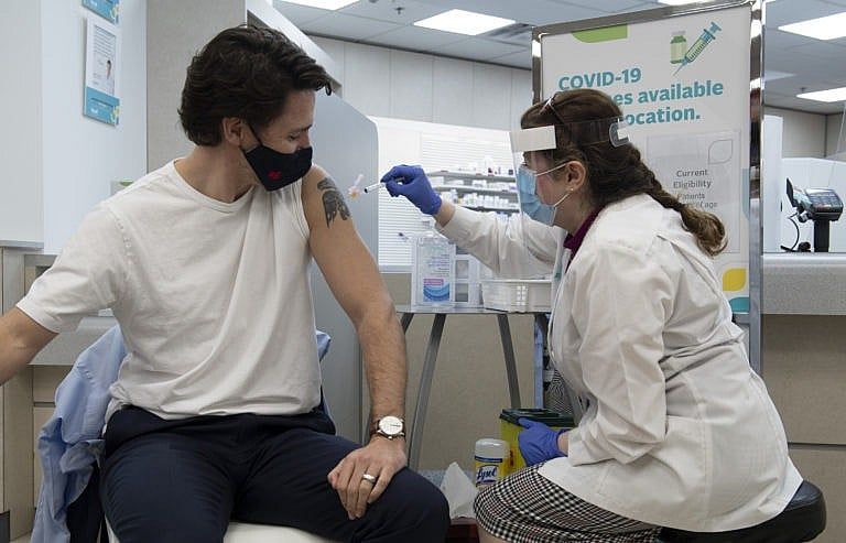 Prime Minister Justin Trudeau receives his COVID vaccination in Ottawa, Friday April 23, 2021. THE CANADIAN PRESS/Adrian Wyld